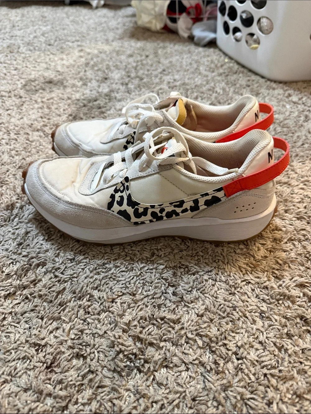 Nike White Sneakers with Red Interior and Black Swoosh